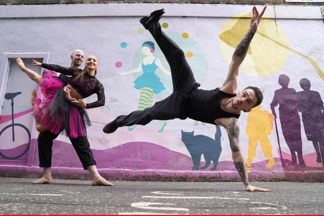 Ballet dancers Kealy Fouracre, Tyrone Anthony and street perfomer Riley Hinds from from Beats on Pointe pose in traditional dance and contemporary street costumes at the mural in Gifford Park ahead of the Australian ballet company's return to the Edinburgh Festival Fringe. Picture: Andrew Milligan/PA Wire