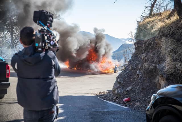 A car that was being driven by Top Gear presenters Chris Harris and Eddie Jordan in Monaco, as they have escaped without injury after it burst into flames during filming. Picture: BBC/PA Wire