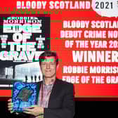 Robbie Morrison, winner of The Bloody Scotland Debut Crime Novel Of The Year in the The Albert Halls at Bloody Scotland, Scotland's International Crime Writing Festival  in Stirling on the 17/09/2021. Picture: Paul Reich