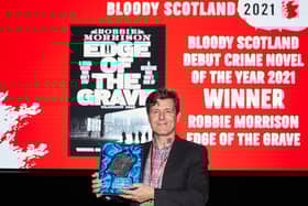 Robbie Morrison, winner of The Bloody Scotland Debut Crime Novel Of The Year in the The Albert Halls at Bloody Scotland, Scotland's International Crime Writing Festival  in Stirling on the 17/09/2021. Picture: Paul Reich