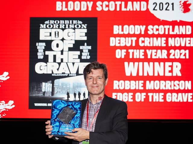 Robbie Morrison, winner of The Bloody Scotland Debut Crime Novel Of The Year in the The Albert Halls at Bloody Scotland, Scotland's International Crime Writing Festival  in Stirling on the 17/09/2021. Picture: Paul Reich