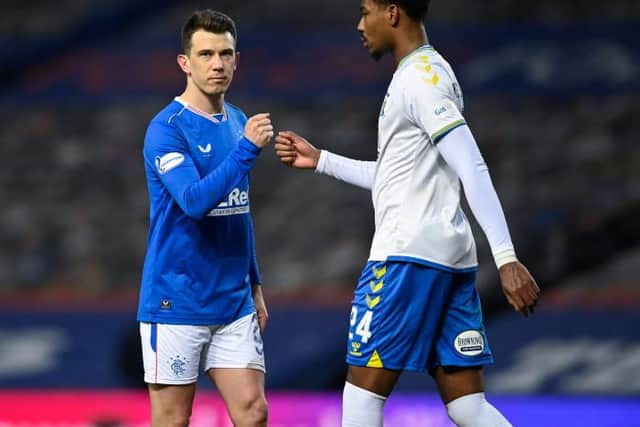 Rangers' Ryan Jack (L) and Kilmarnock's Zech Medley at full time during a Scottish Premiership match between Rangers and Kilmarnock at Ibrox Stadium, on February 13, 2021, in Glasgow, Scotland. (Photo by Rob Casey / SNS Group)