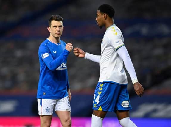 Rangers' Ryan Jack (L) and Kilmarnock's Zech Medley at full time during a Scottish Premiership match between Rangers and Kilmarnock at Ibrox Stadium, on February 13, 2021, in Glasgow, Scotland. (Photo by Rob Casey / SNS Group)