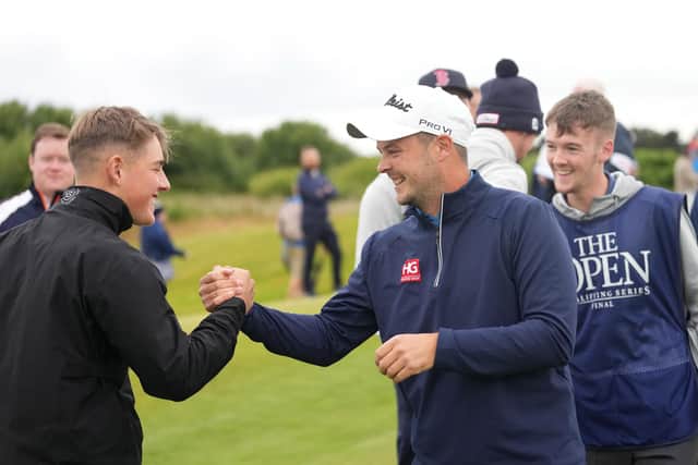 Local man Jack McDonald celebrates after winning a play-off in Final Qualifying for The Open at Dundonald Links in Ayrshire. Picture: Mark Runnacles/R&A/R&A via Getty Images.