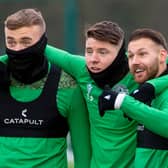 Hibs' Martin Boyle (R),  will be happy if the Easter Road club manage to keep hold of (L-R) Ryan Porteous and Kevin Nisbet. Photo by Ross MacDonald / SNS Group