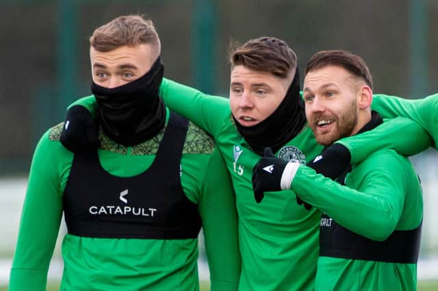 Hibs' Martin Boyle (R),  will be happy if the Easter Road club manage to keep hold of (L-R) Ryan Porteous and Kevin Nisbet. Photo by Ross MacDonald / SNS Group