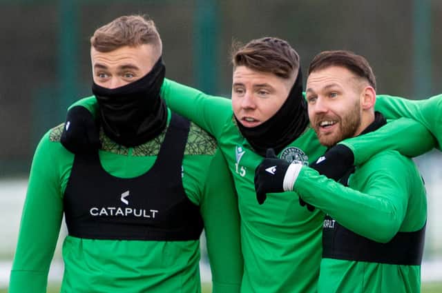 Hibs' Martin Boyle (R), will be happy if the Easter Road club manage to keep hold of (L-R) Ryan Porteous and Kevin Nisbet. Photo by Ross MacDonald / SNS Group