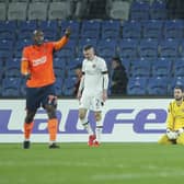 Hearts' goalkeeper Craig Gordon sits on the ground after his mistake led to Basaksehir's Serdar Gurler scoring his side's second goal. (AP Photo)