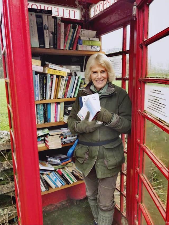 The Duchess of Cornwall who has placed copies of some of her favourite books in a red phone box library, the tiny library exchange in Abergeldie in rural Aberdeenshire, for the public to discover.