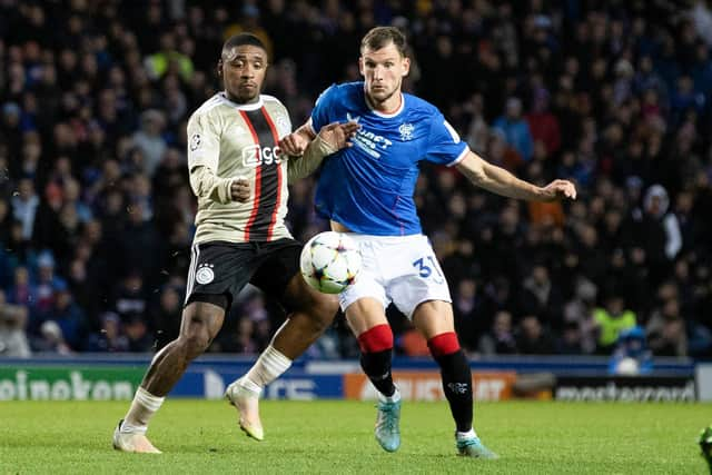 Rangers defender Borna Barisic is challenged by Ajax's Steven Bergwijn during the Champions League match at Ibrox. (Photo by Alan Harvey / SNS Group)