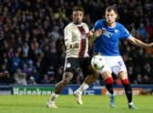 Rangers defender Borna Barisic is challenged by Ajax's Steven Bergwijn during the Champions League match at Ibrox. (Photo by Alan Harvey / SNS Group)