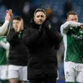 Hibs manager Lee Johnson applauds the away fans at full time after the 3-2 defeat to Rangers at Ibrox.  (Photo by Craig Williamson / SNS Group)