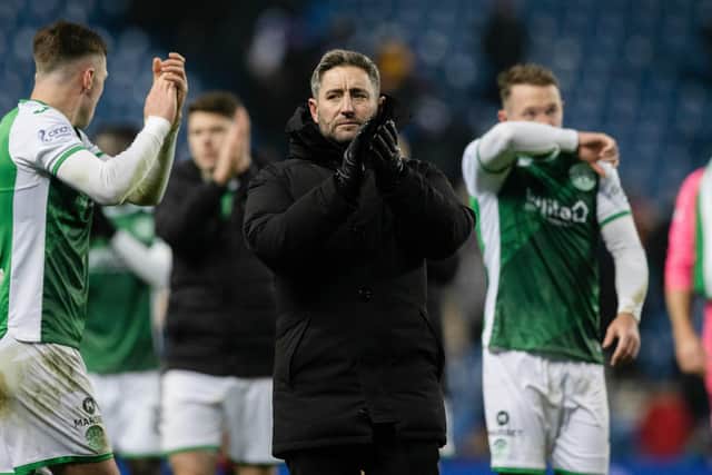 Hibs manager Lee Johnson applauds the away fans at full time after the 3-2 defeat to Rangers at Ibrox. (Photo by Craig Williamson / SNS Group)