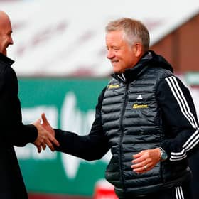 Chris Wilder, right, has been tipped to succeed Sean Dyche at Burnley if the Clarets boss is tempted south to Crystal Palace