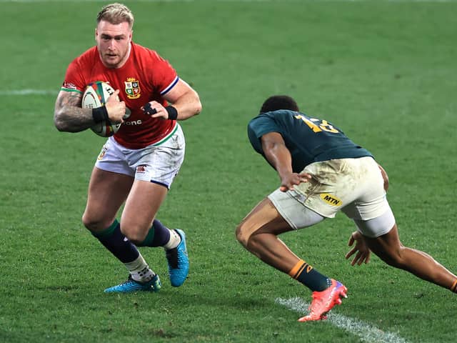 Scotland star Stuart Hogg takes on Lukhanyo Am during this weekend's match between the British and Irish Lions and South Africa in Cape Town