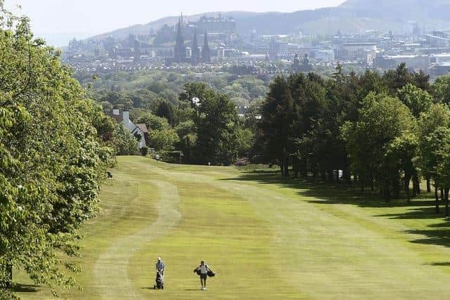 Two members enjoy a game at Murrayfield Golf Club, close to Edinburgh city centre. Picture: Lisa Ferguson.