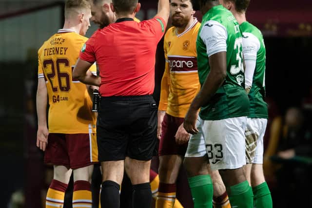 Motherwell's Liam Donnelly (centre) is sent off by referee Andrew Dallas.