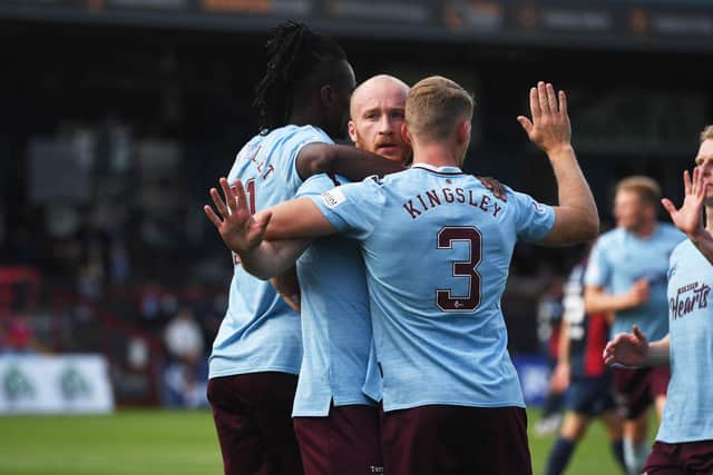 Liam Boyce and Stephen Kingsley both scored for Hearts in Dingwall.