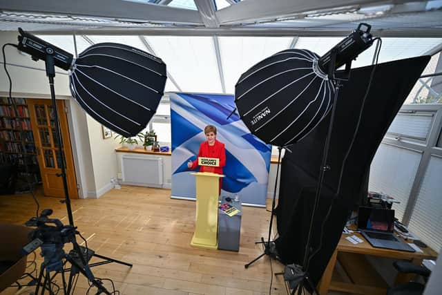 Nicola Sturgeon launches her party's manifesto from a conservatory at her home in Glasgow.