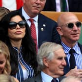 Companies like internet retail giant Amazon, founded by the world's richest person, Jeff Bezos, seen wearing sunglasses at Wimbledon in 2019, need to pay more tax, says Andrew Morrison (Picture: Mike Egerton/PA Wire)
