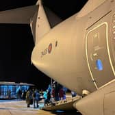 Photo issued by the Ministry of Defence (MoD) of UK nationals disembarking from an A400M transport plane at Larnaca International Airport in Cyprus. The first flight evacuating UK civilians from Sudan landed at the airport, with 39 people on board.