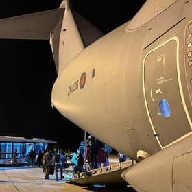 Photo issued by the Ministry of Defence (MoD) of UK nationals disembarking from an A400M transport plane at Larnaca International Airport in Cyprus. The first flight evacuating UK civilians from Sudan landed at the airport, with 39 people on board.