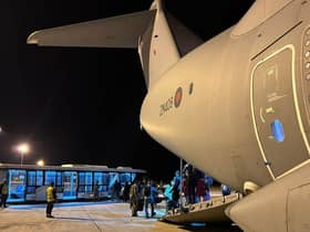 Photo issued by the Ministry of Defence (MoD) of UK nationals disembarking from an A400M transport plane at Larnaca International Airport in Cyprus. The first flight evacuating UK civilians from Sudan landed at the airport, with 39 people on board.