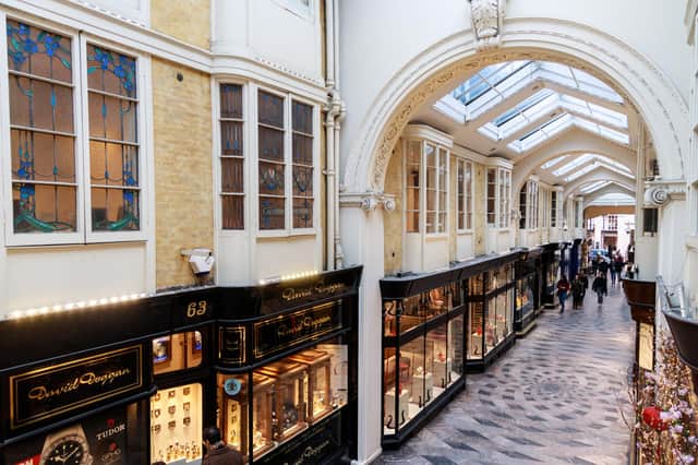 The arcade stretches nearly 200 yards, including a coterie of retailers with Scottish connections. Picture: Ng Wai Hung.