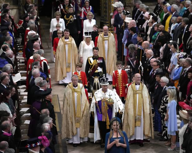 King Charles III and Queen Camilla walk in the Coronation Procession at Westminster Abbey on May 6, 2023 (Photo by Kirsty Wigglesworth  - WPA Pool/Getty Images)