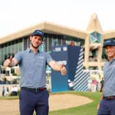 Thomas Pieters and Alex Noren celebrate beating Tommy Fleetwood and Shane Lowry on the opening day of the new Hero Cup at Abu Dhabi Golf Club. Picture: Andrew Redington/Getty Images.