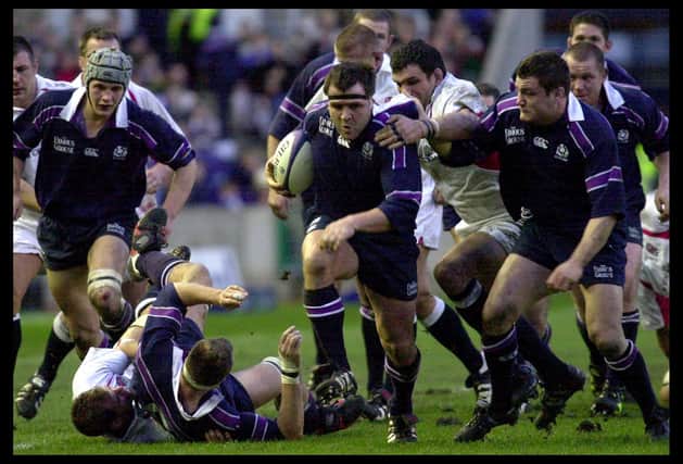 Tom Smith on the attack against England at Murrayfield. Picture: Christopher Furlong