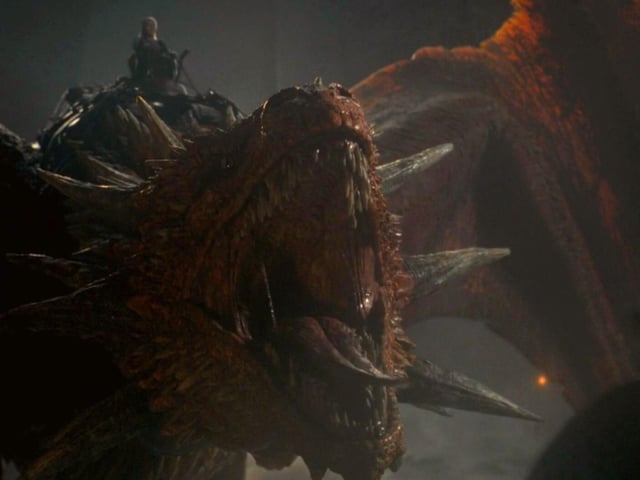 Meleys The Red Queen is flown by the realm's most experienced dragonrider Rhaenys Targaryen, the queen who never was, who is married to Corly Velaryon. The she-dragon's exact age is unclear but it’s thought she is one of the second generation of dragons after Balerion - so around 100. She is huge and experienced in battle.