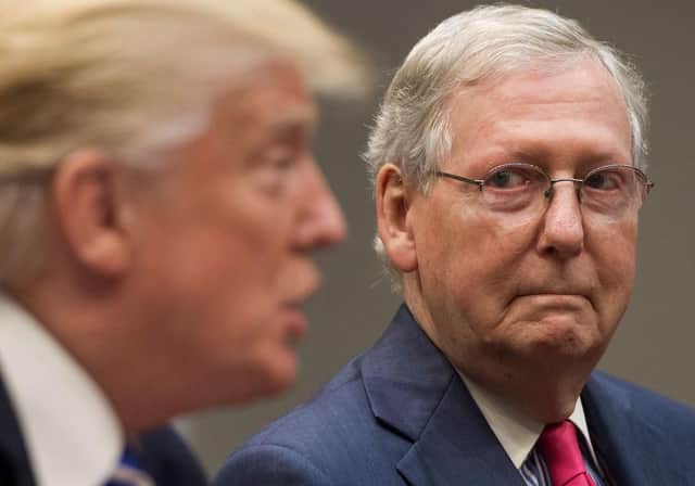 Mitch McConnell has said he will keep an open mind when it comes to deciding whether Donald Trump should be convicted of impeachment (Getty Images)