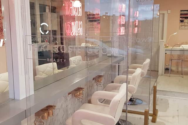 Steps the salon has taken include installing bespoke divider screens made in Perspex. Picture: contributed.
