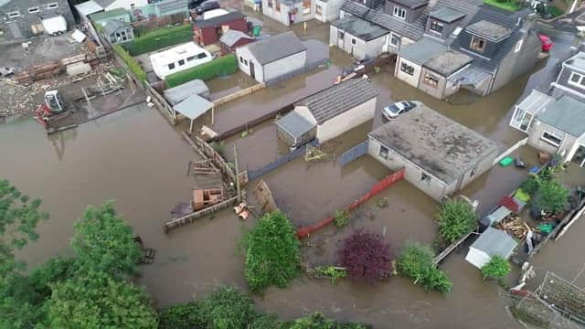 The flood water was still high on Wednesday afternoon.