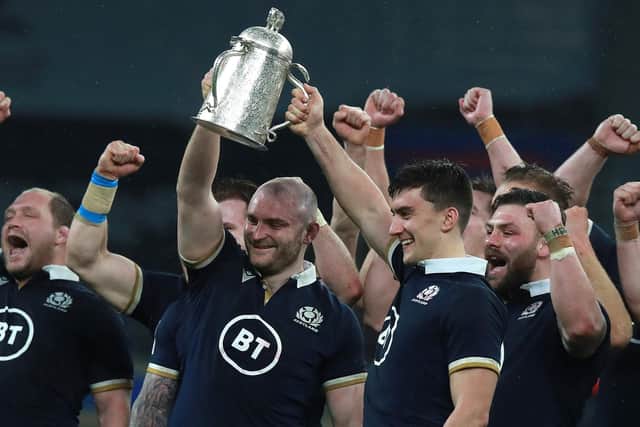 Cameron Redpath lifts the Calcutta Cup with fellow debutant Dave Cherry. Picture: David Rogers/Getty Images
