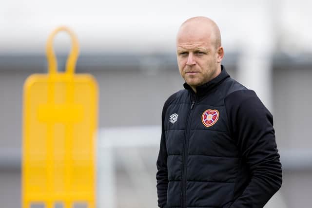 Steven Naismith oversees Hearts' training ahead of Wednesday's match against Rangers at Ibrox.