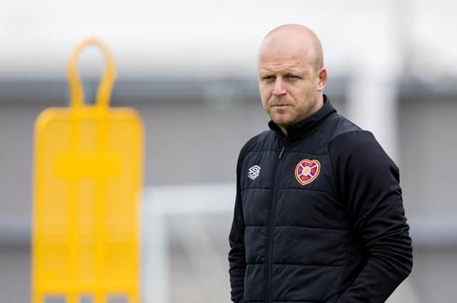 Steven Naismith oversees Hearts' training ahead of Wednesday's match against Rangers at Ibrox.