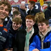 Jamie Ritchie takes a selfie with fans after Edinburgh's final game of the season, against Ulster.  (Photo by Leah Scholes/INPHO/Shutterstock)