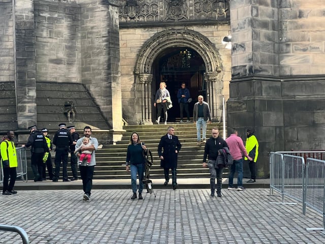 Members of the public leaving St Giles'