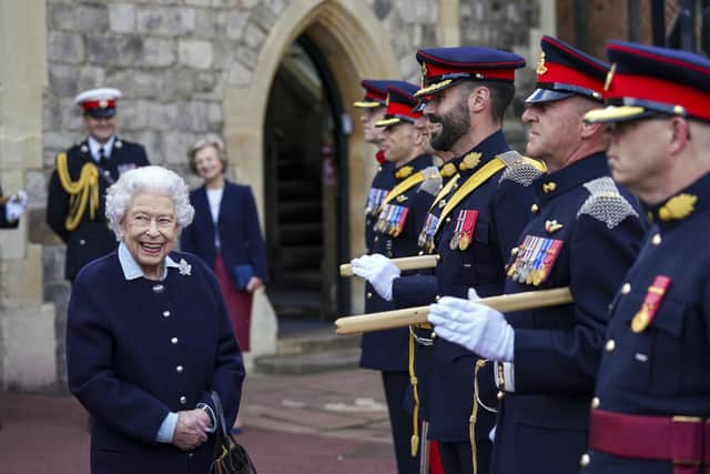 Queen Elizabeth meets members of the Royal Regiment of Canadian Artillery at Windsor Castle in October last year (Picture: Steve Parsons/PA)