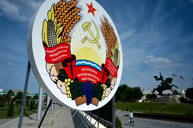 A huge coat of arms of Transnistria - Moldova's pro-Russian breakaway region on the eastern border with Ukraine, in Transnistria's capital of Tiraspol.. The breakaway region of ex-Soviet Moldova, which borders western Ukraine, saw explosions hit its security ministry on Monday and a radio tower on Tuesday morning. The incidents come after a senior Russian military official last week raised the issue of "oppression" of Russian speakers in Transnistria in the context of Russia's military campaign in Ukraine. (Photo by Sergei Gapon via Getty Images)