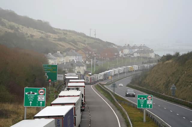 Freight lorries queuing on the M20 motorway in Kent heading to Dover. A rush of passengers travelling to France to beat the country’s ban on UK tourists has led to a knock-on effect on freight traffic, resulting in long queues of lorries.