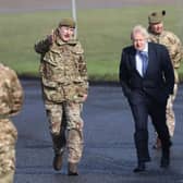 Prime Minister Boris Johnson has been accused of breaking his promise to protect the armed forces, amid reports that a major overhaul of the army could see troop numbers cut by around 10,000. (Photo by Peter Morrison - WPA Pool/Getty Images)