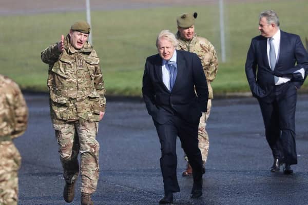 Prime Minister Boris Johnson has been accused of breaking his promise to protect the armed forces, amid reports that a major overhaul of the army could see troop numbers cut by around 10,000. (Photo by Peter Morrison - WPA Pool/Getty Images)