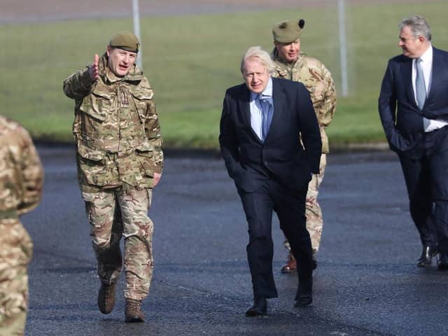 Prime Minister Boris Johnson has been accused of breaking his promise to protect the armed forces, amid reports that a major overhaul of the army could see troop numbers cut by around 10,000. (Photo by Peter Morrison - WPA Pool/Getty Images)
