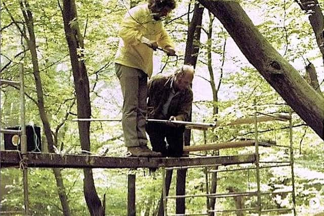 Julian Doyle is noted for being the the special effects designer for Monty Python and the Holy Grail, and editor of Monty Python’s Life of Brian. In this picture, the famed ‘Black Knight’ scene from Holy Grail is being set up for filming