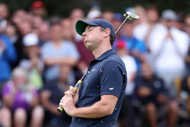 Rory McIlroy reacts afer his eagle putt at the last to force a play-off stayed above ground. Picture: Warren Little/Getty Image.