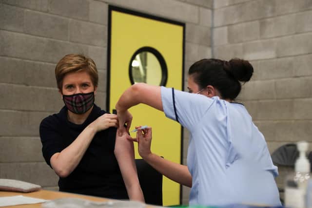 First Minister of Scotland Nicola Sturgeon receives her booster jab of the coronavirus vaccine in Glasgow. Photo: Russell Cheyne/PA Wire