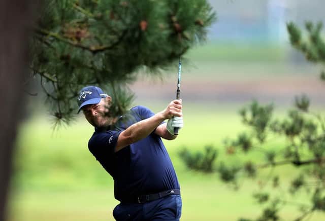 David Drysdale plays his second shot on the ninth hole during the opening round of BMW PGA Championship at Wentworth. Picture: Warren Little/Getty Images.
